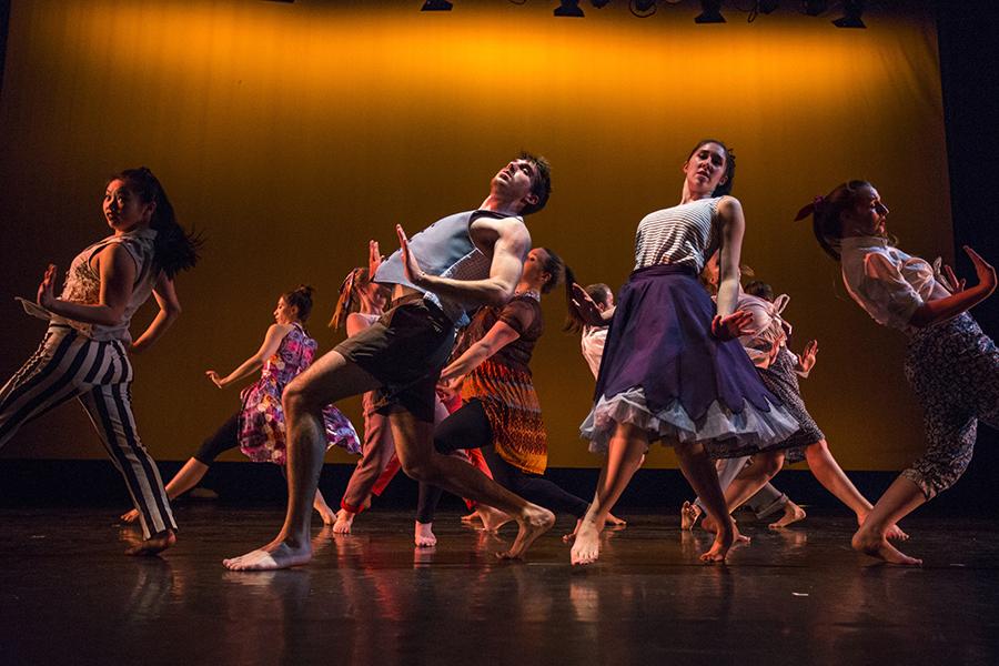 People dancing on stage.