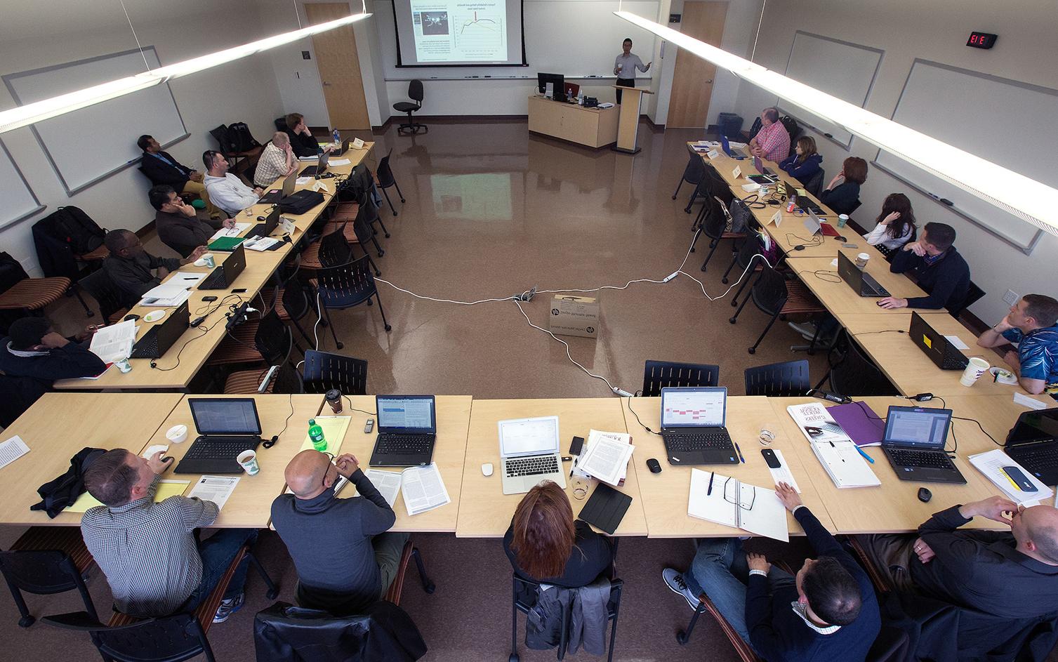 Henry Balani, seated at right with a green binder in front of him, was a member of the first cohort of <a href='http://ldlfek.lihuang-led.com'>足彩平台</a>’s DBA program.